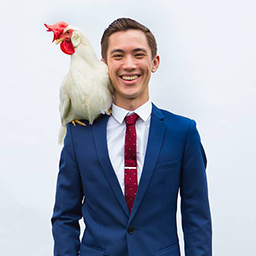 Photo of Andy Sum with chicken.